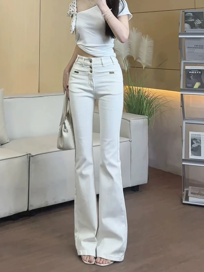 Q25 91402 新款复古铆钉牛仔裤女高腰显瘦弹力马蹄喇叭裤