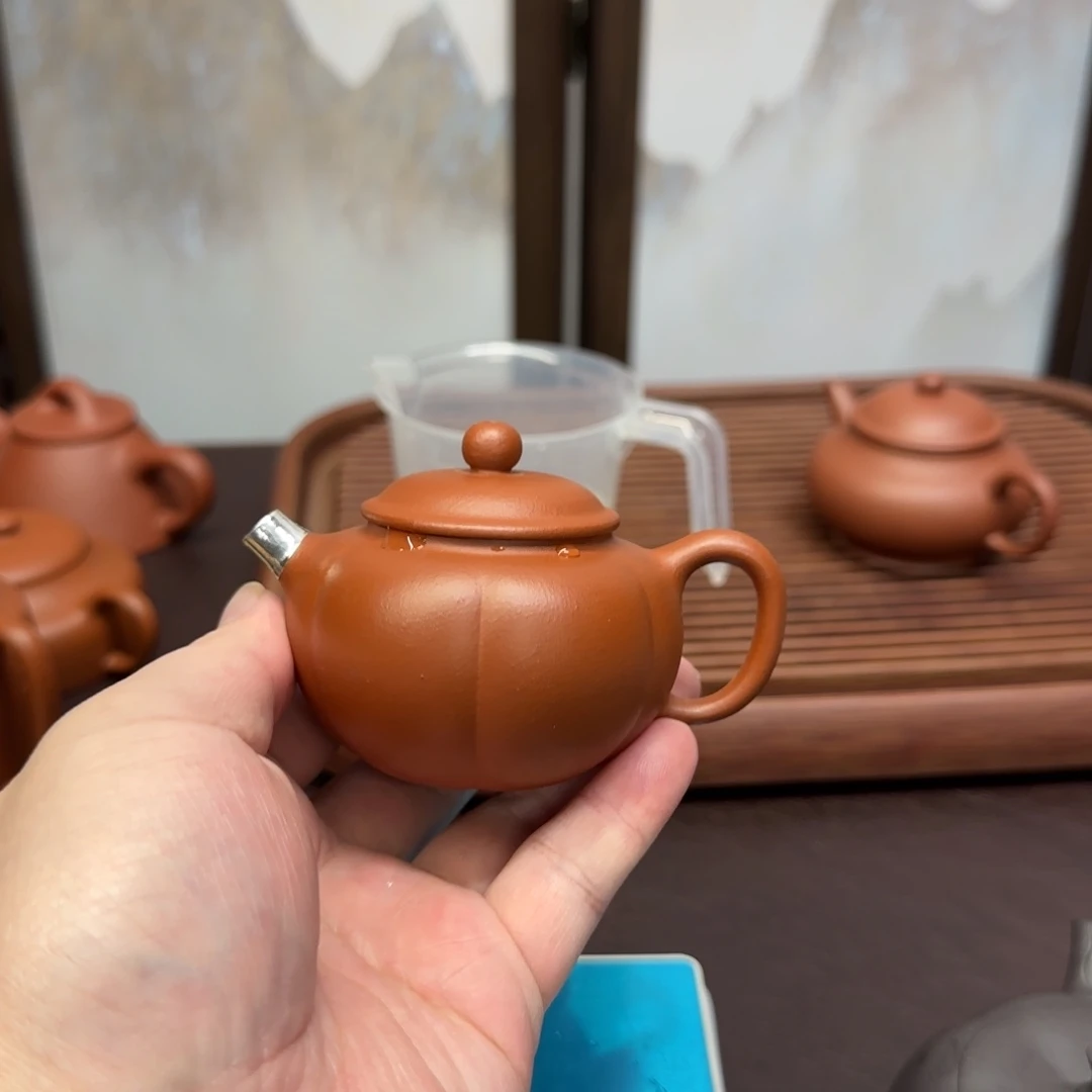 紫砂茶壶红朱泥筋纹贡珠包银