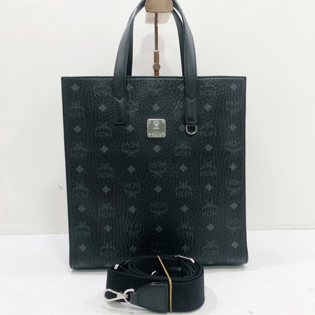 95新 MCM MCM全皮黑色印花琴谱手提单肩斜挎包