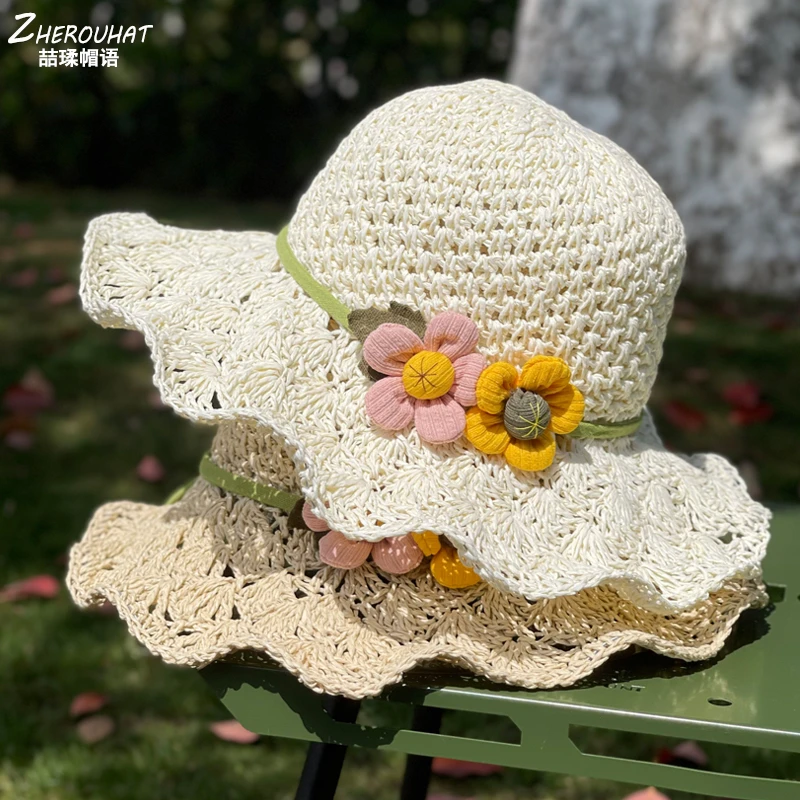 白色草帽女夏天海边度假遮阳大檐沙滩帽手工镂空花朵渔夫旅游帽子