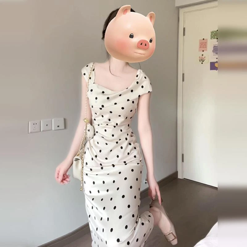 法式白色波点吊带连衣裙子女春秋季2025新款收腰显瘦修身包臀长裙