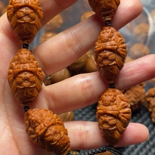 橄榄核吊坠千手观音