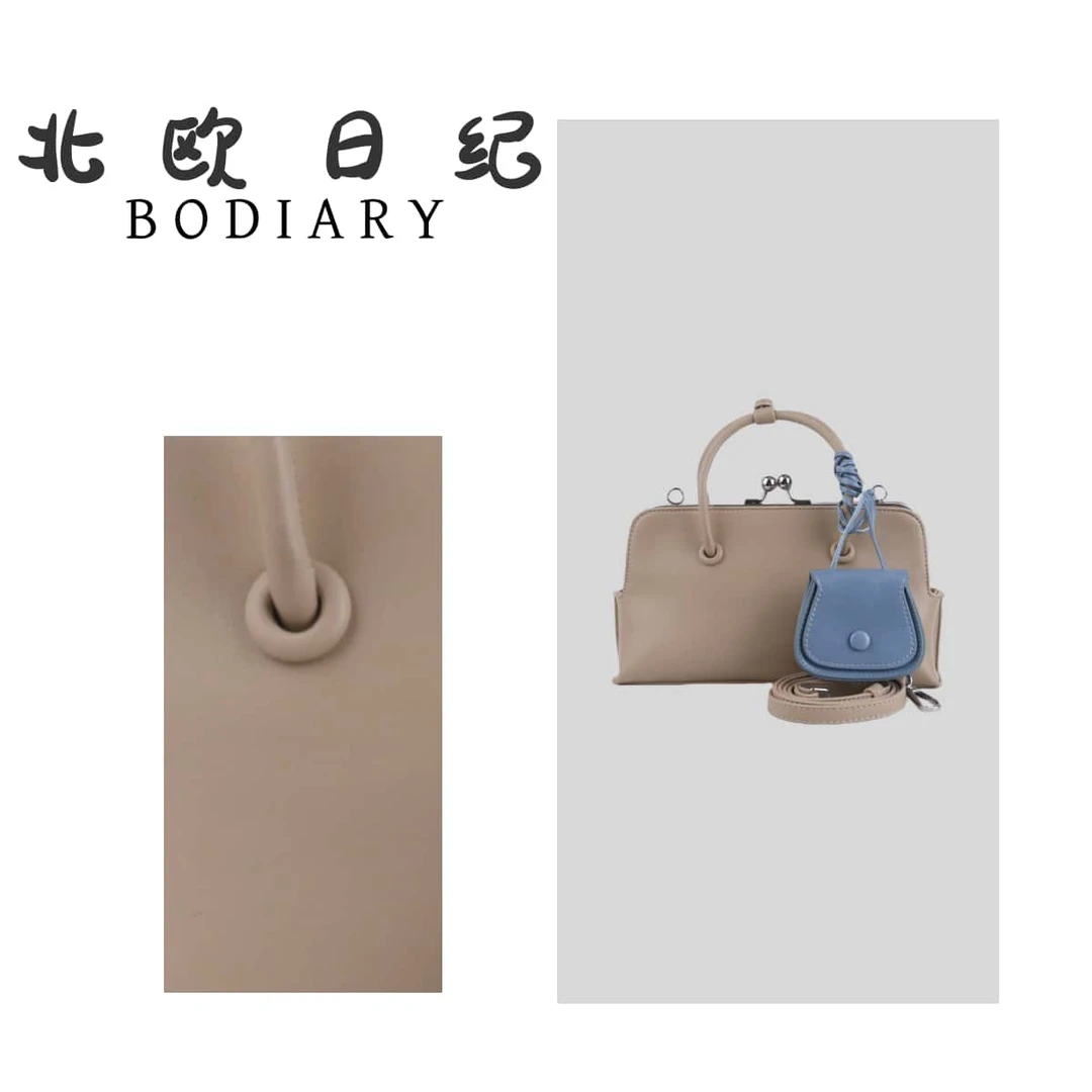 北欧日纪3225-复古夹子包简约女士手提设计师包包
