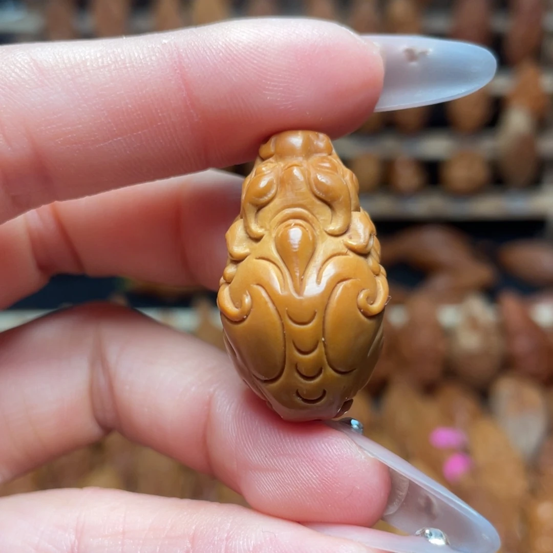 橄榄核把件独角貔貅