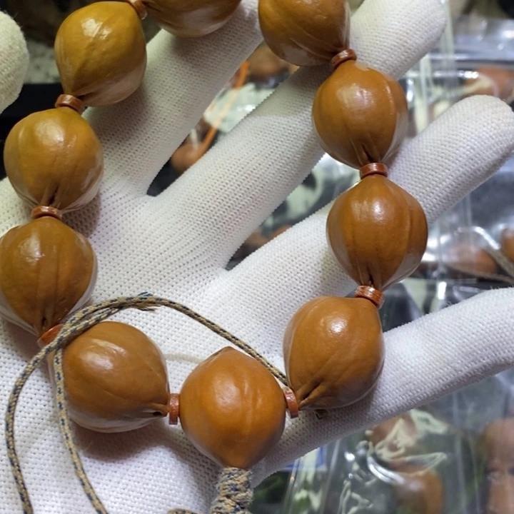 哦***哦橄榄核吊坠铁核三面佛