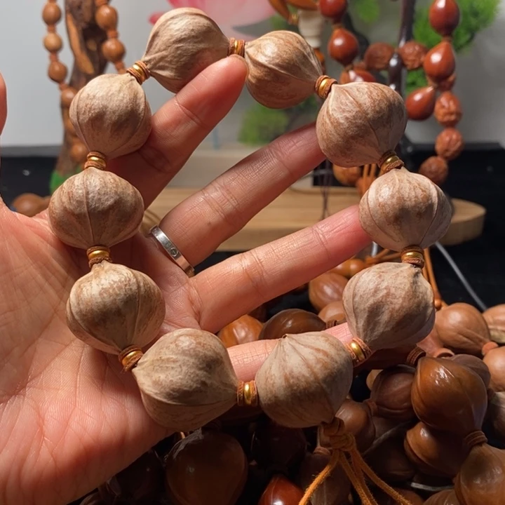 信***司橄榄核手串/手链2.7四花短原皮