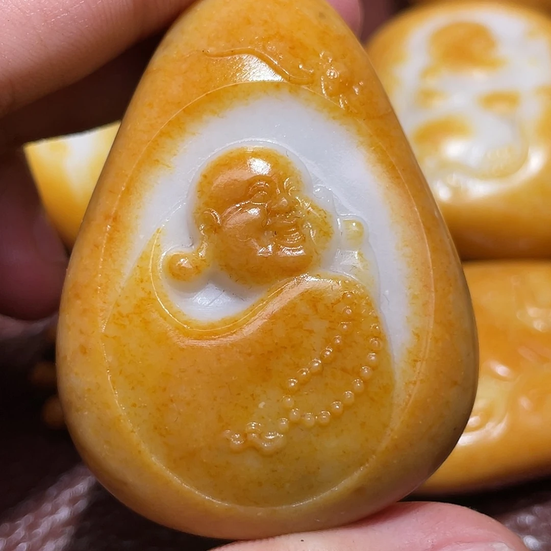 和田玉未镶嵌颈饰涡*