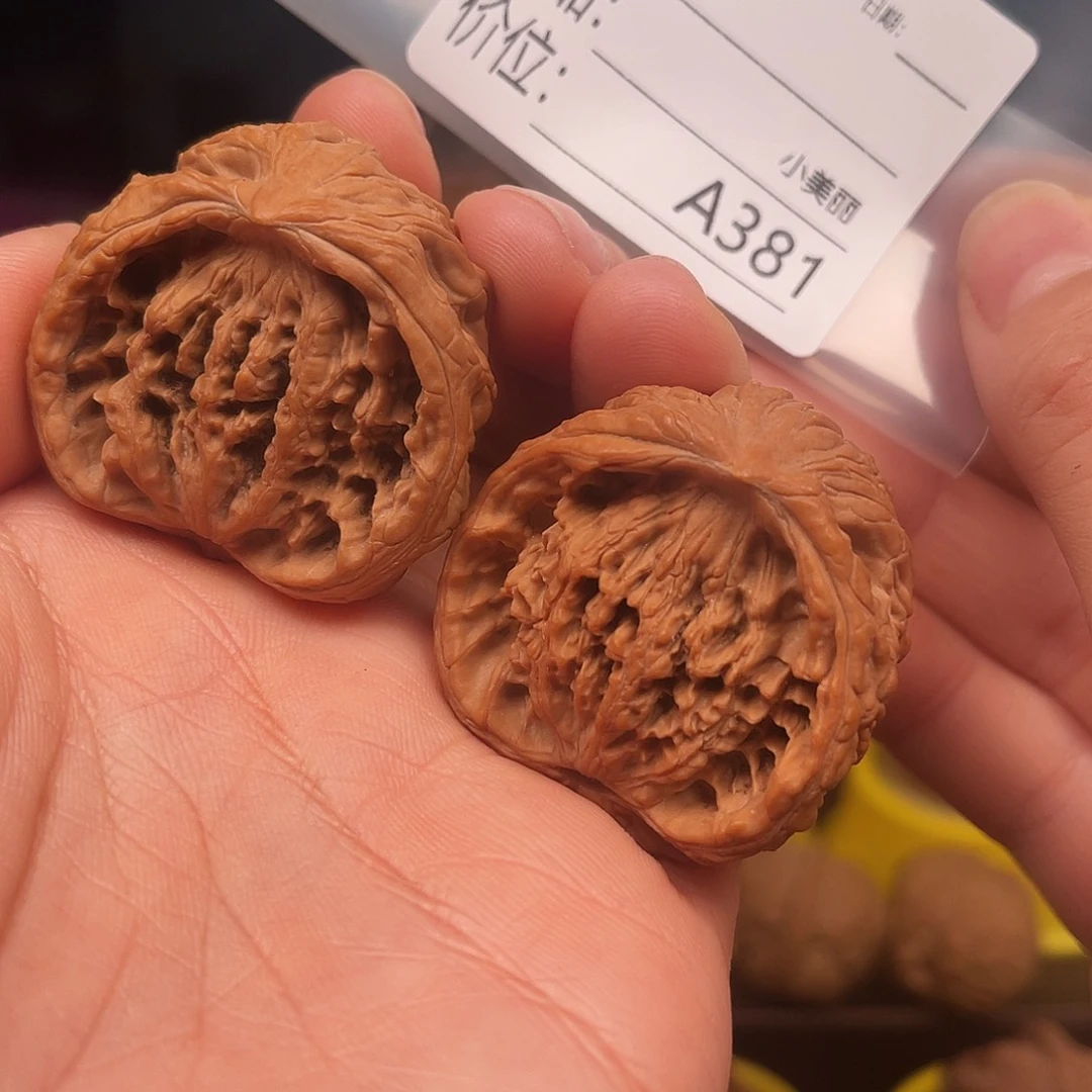 绥***谭文玩核桃吊坠虎头蛇头聚宝盆