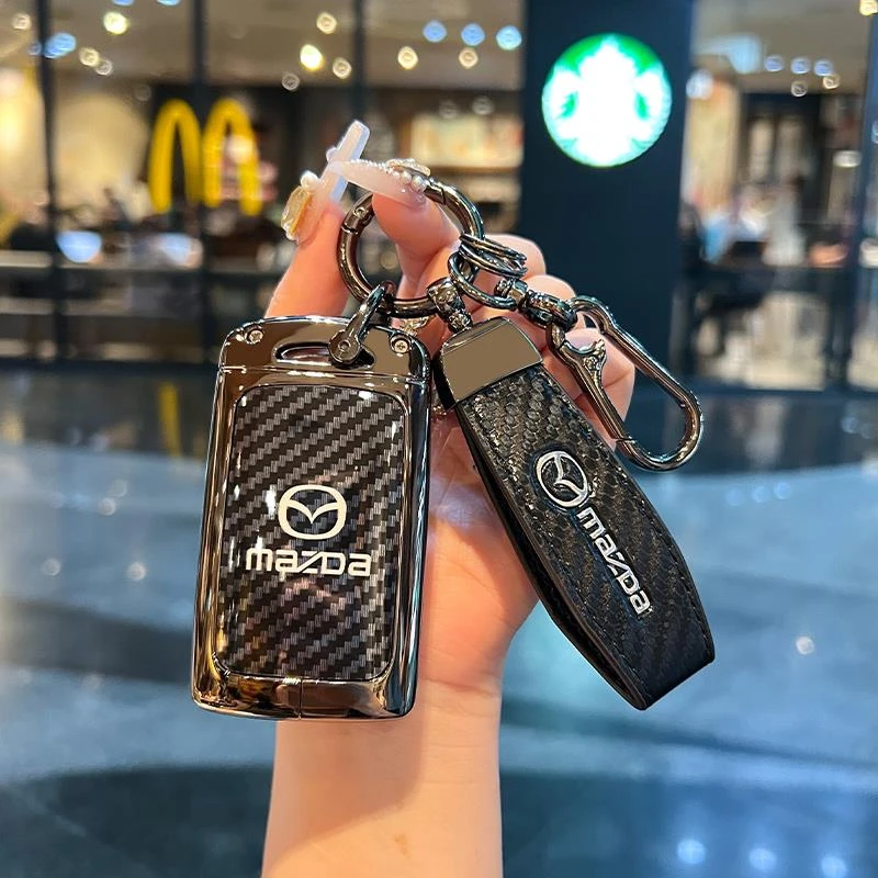 适用马自达钥匙套3昂克赛拉CX4壳CX5车6阿特兹CX30碳纤2扣2024款8