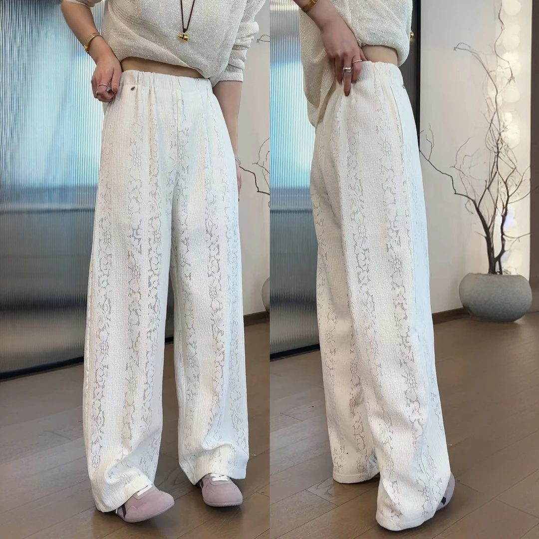 JOJO/玖了个玖 2025春 极简百搭立体剪裁镂空雕花长裤 2502C740