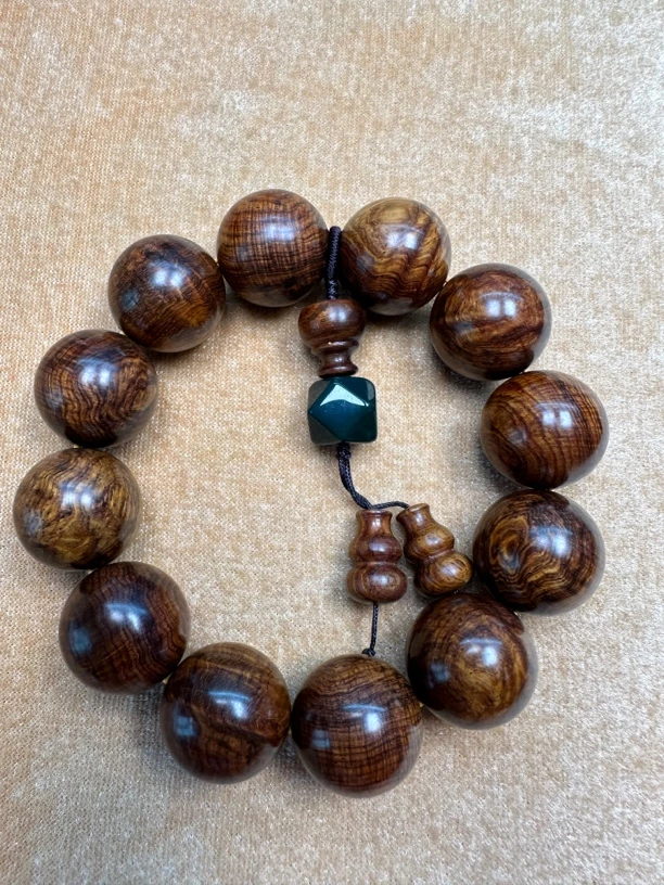 海南黄花梨2.0×12颗紫油梨老料爆满千层水波纹