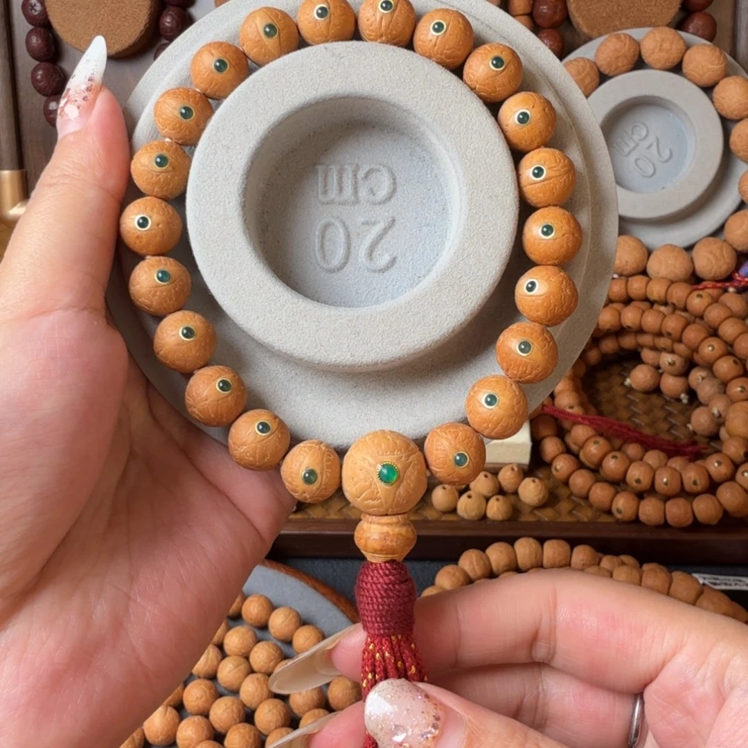 凤眼菩提把件12mm/镶嵌绿玛