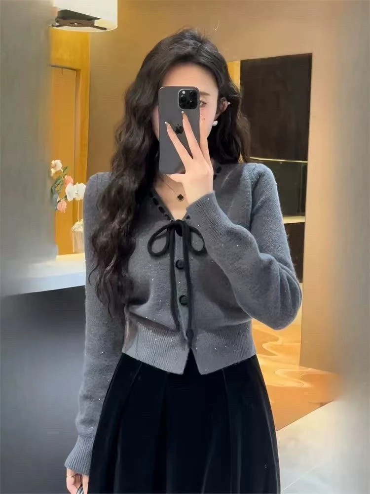 300新款女士长袖气质百搭蝴蝶结显瘦针织衫