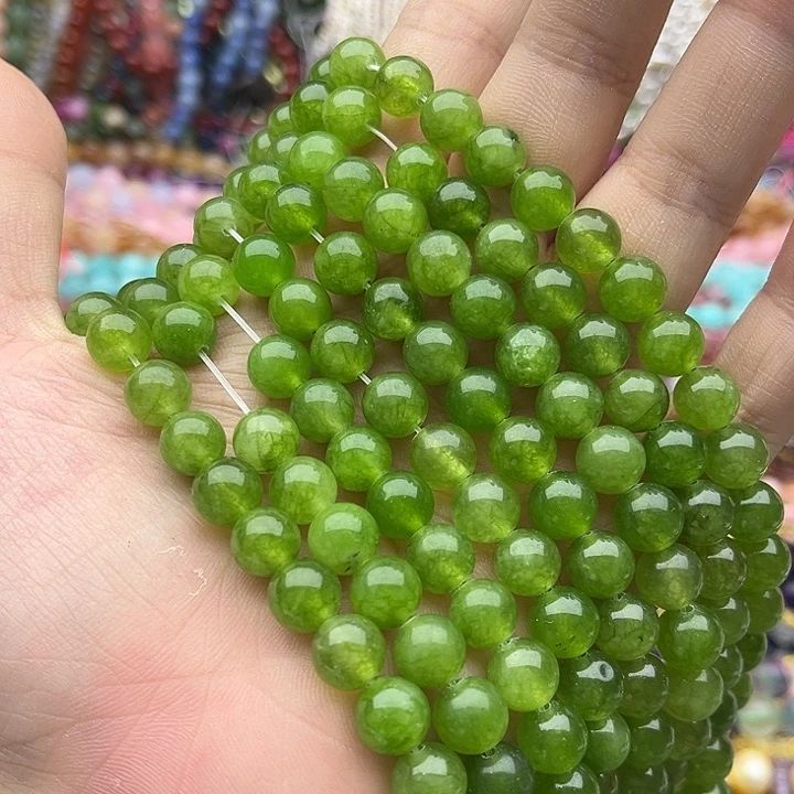 玛瑙/玉髓未镶嵌珠宝半成品2条8mm左右橄榄晶几颗有瑕