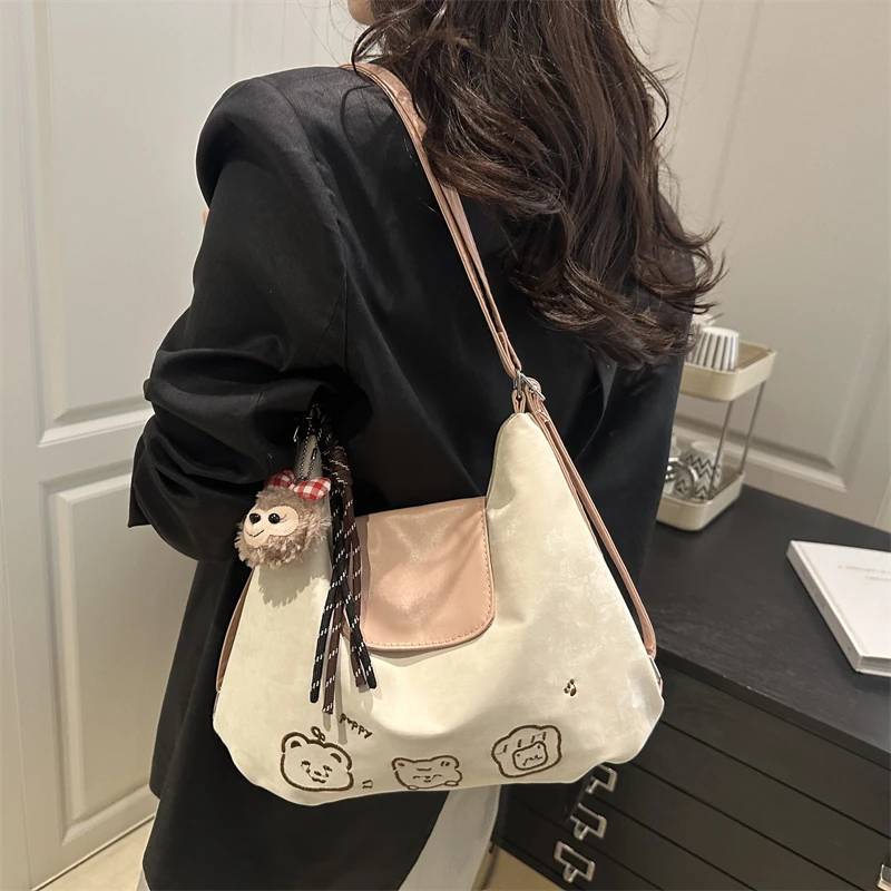 女包2025新款时尚单肩大容量托特包百搭通勤小众双肩包挂包yw