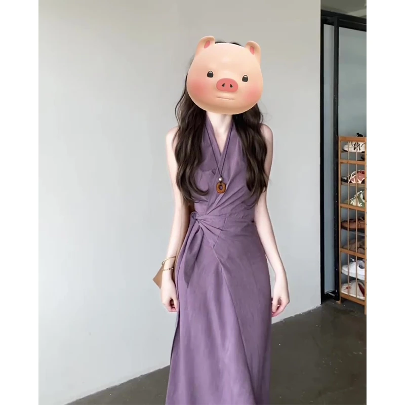 挂脖连衣裙女2025夏季新款法式气质V领绑带设计感收腰中长款裙子