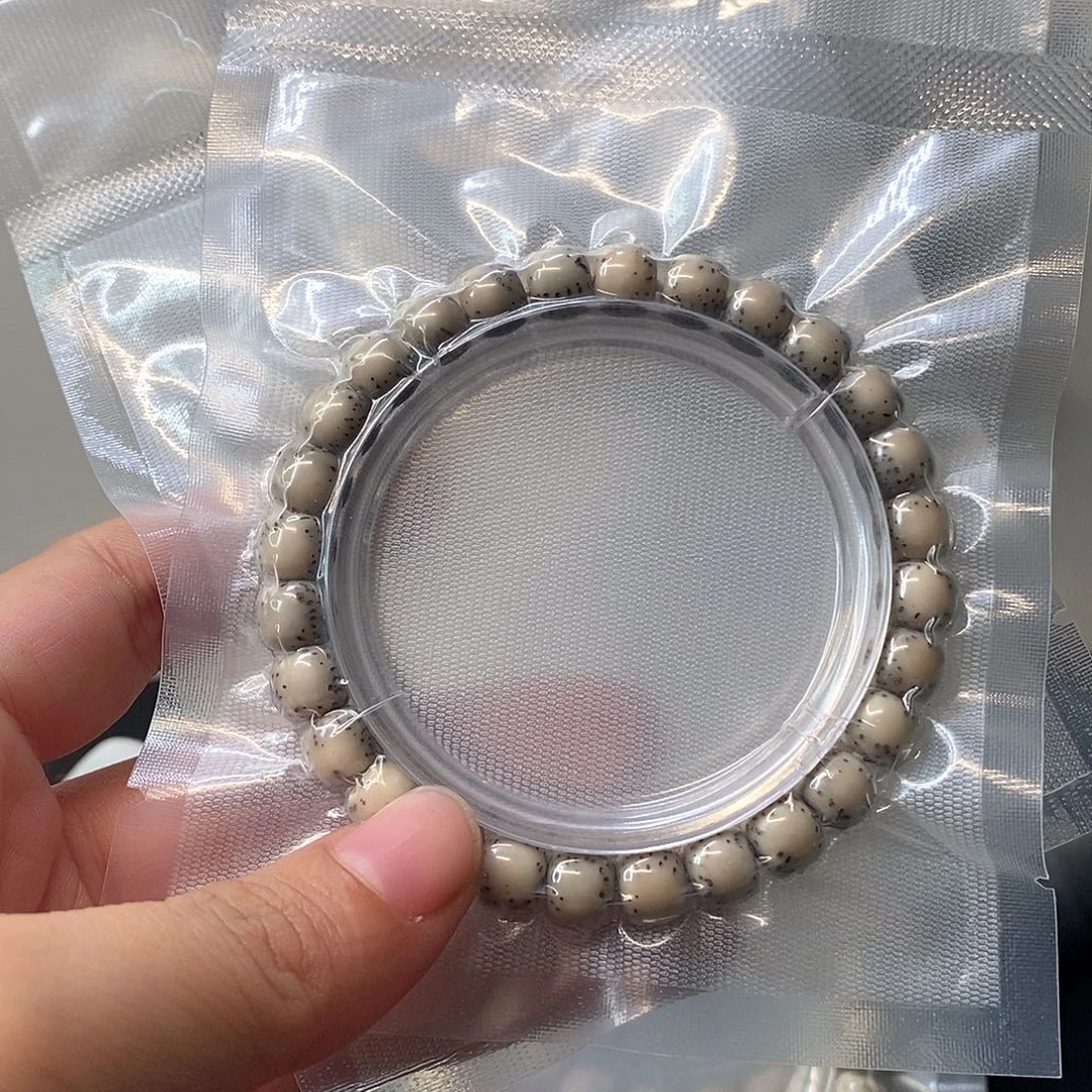 嘉***.星月菩提吊坠石玉河豚8*7单