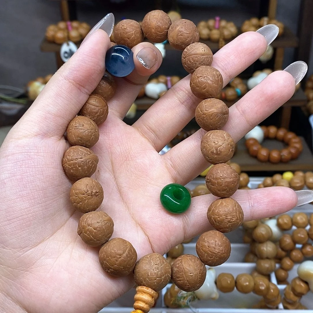 大***儿猴头核桃把件凤眼菩提手持