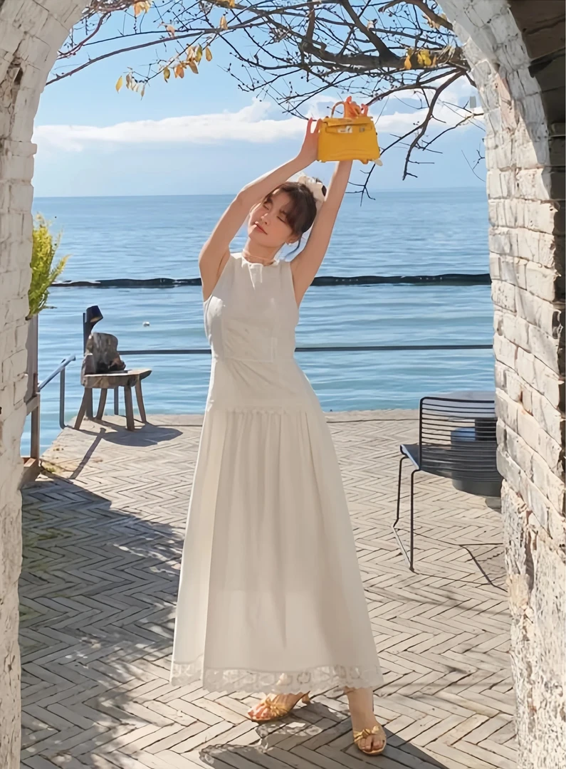 白色连衣裙女夏季2025新款镂空法式初恋度假风无袖收腰背心裙子