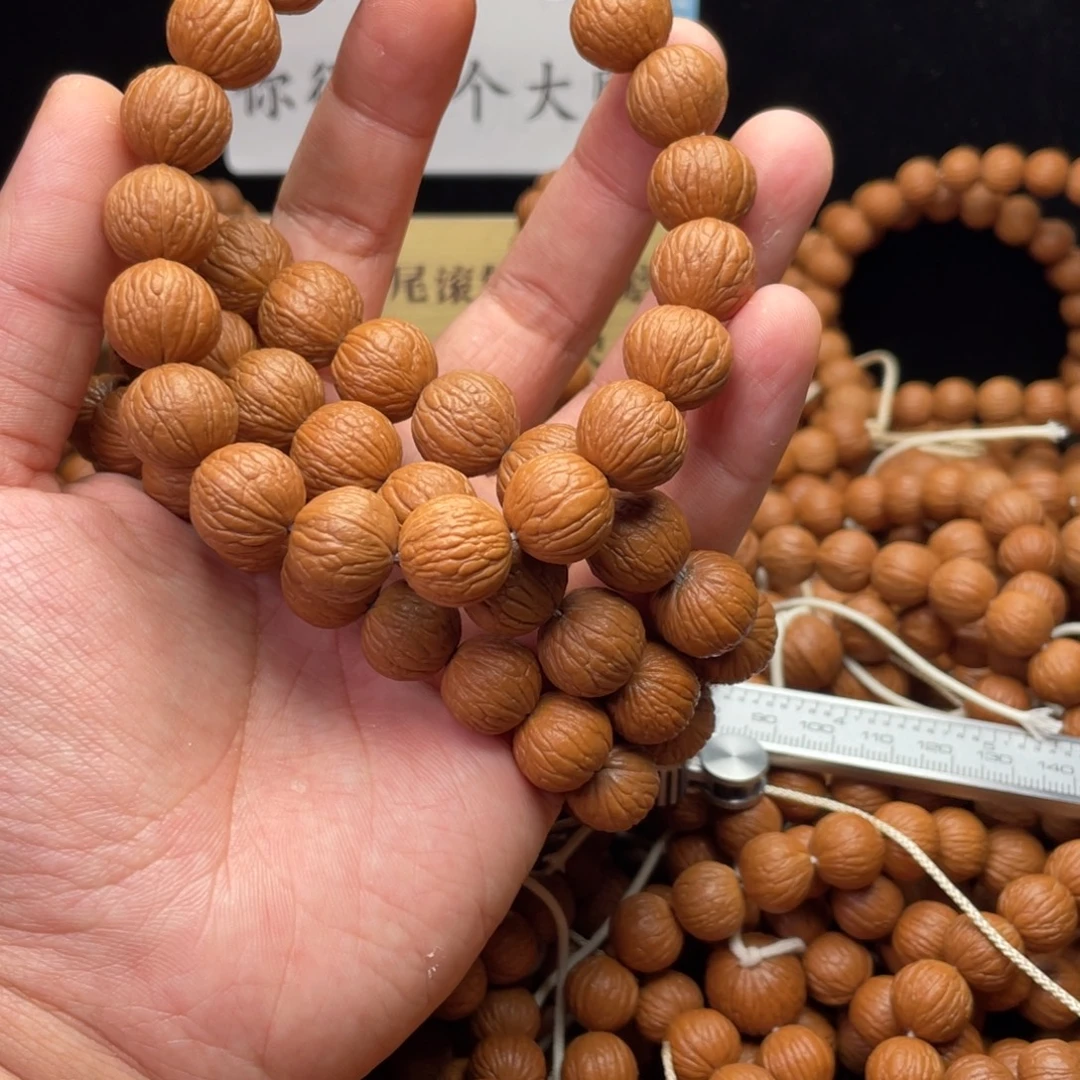 吊坠猴头核桃凤羽