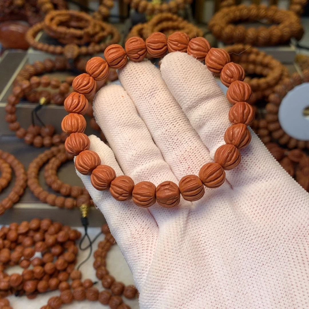 快***达桃核手串秦岭龙纹