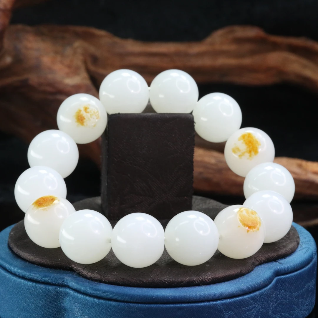 40和田玉羊脂白洒金皮手串/101337上海嘉禾拍卖