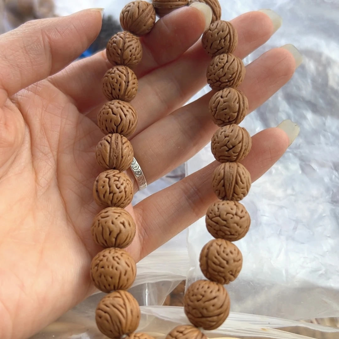 小***干桃核手串野生山桃核手串手持