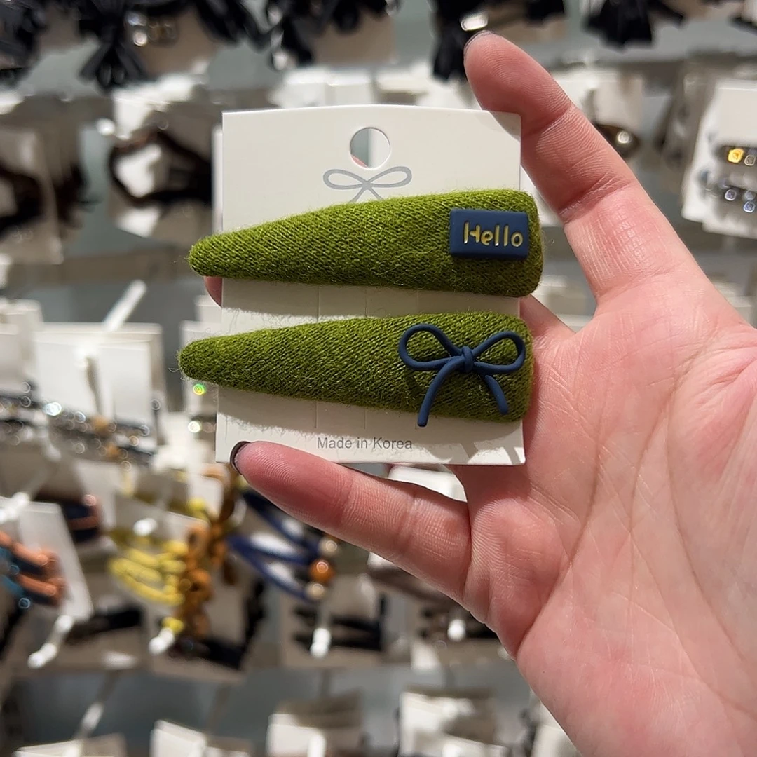 布艺非金属绿色蝴蝶结拜拜夹