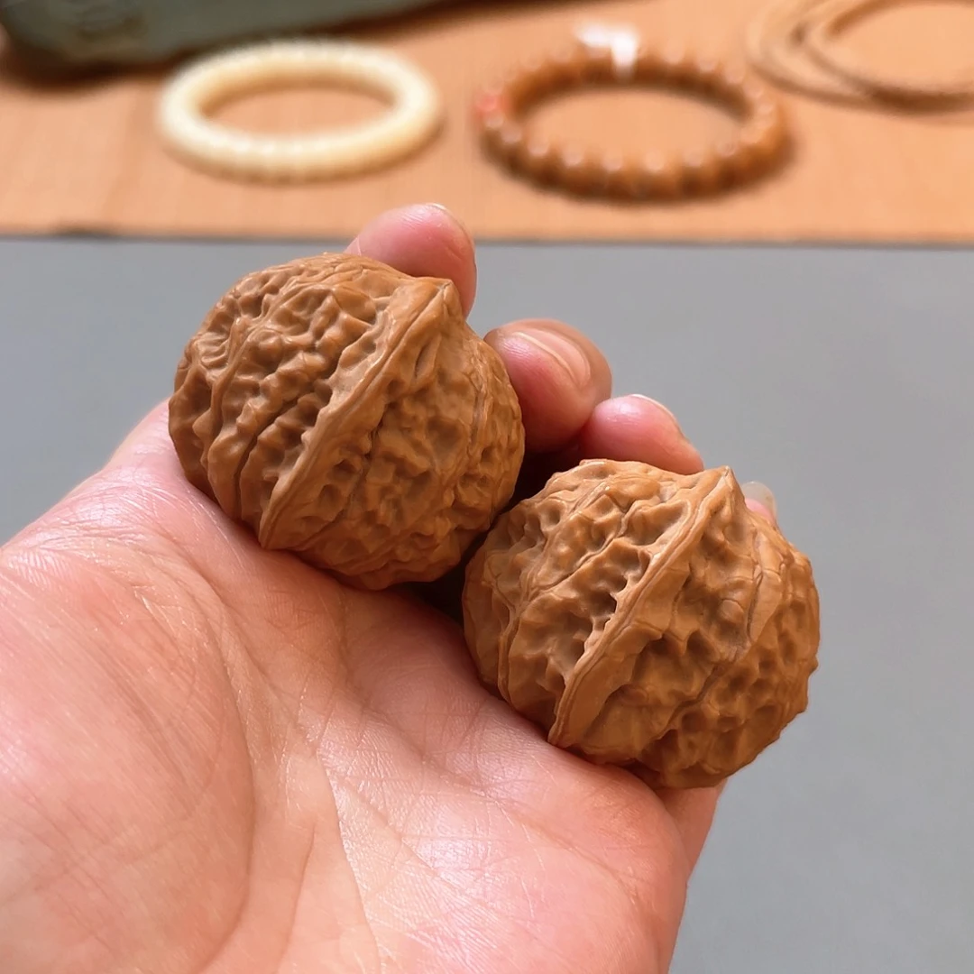桃核把件39×35尺全品白茬黄松峪元宝A366