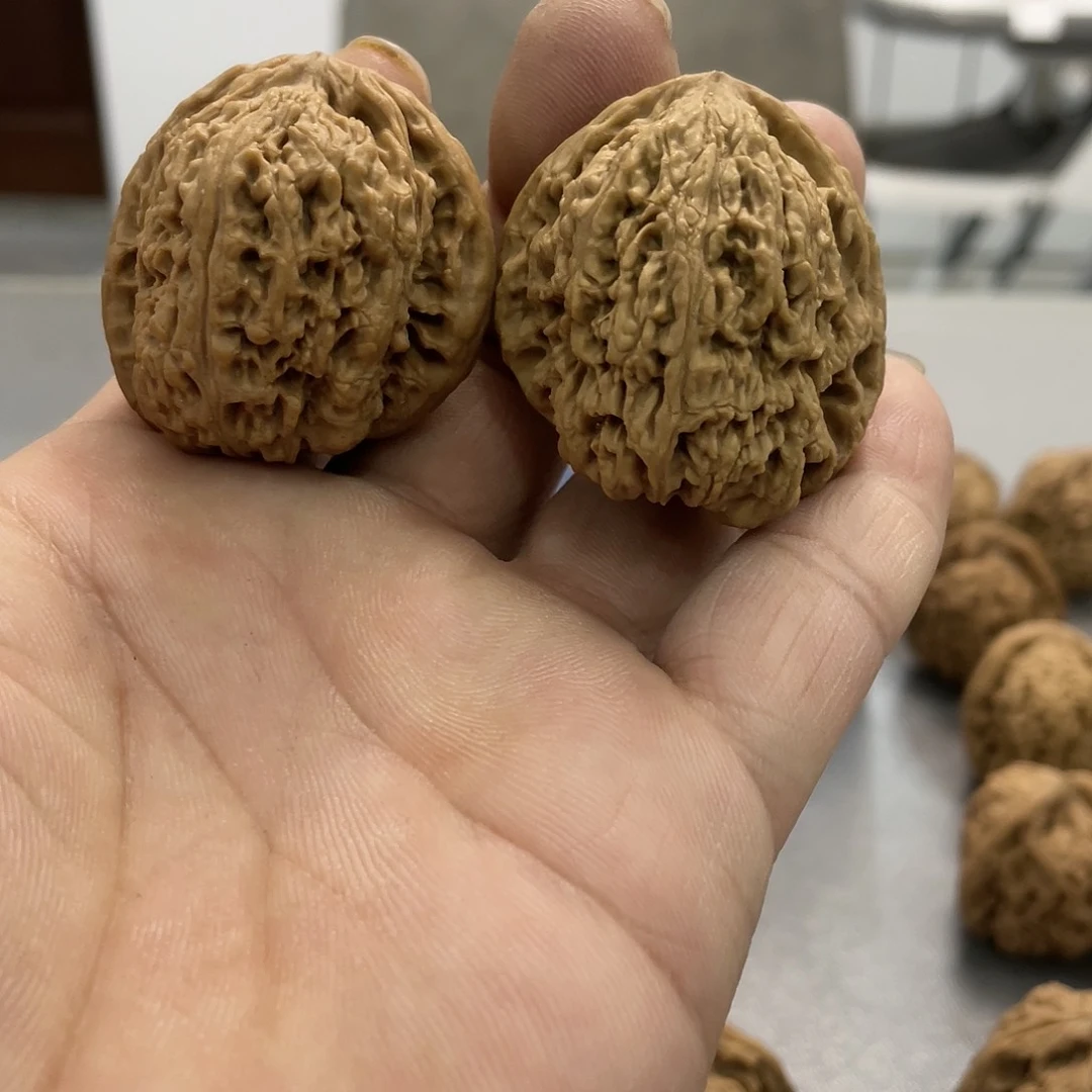 桃核吊坠墨*人文玩核桃南将石