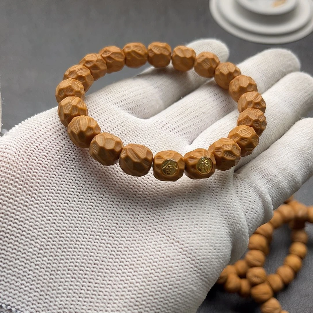 猴头核桃吊坠刀刻无相 舍的双标