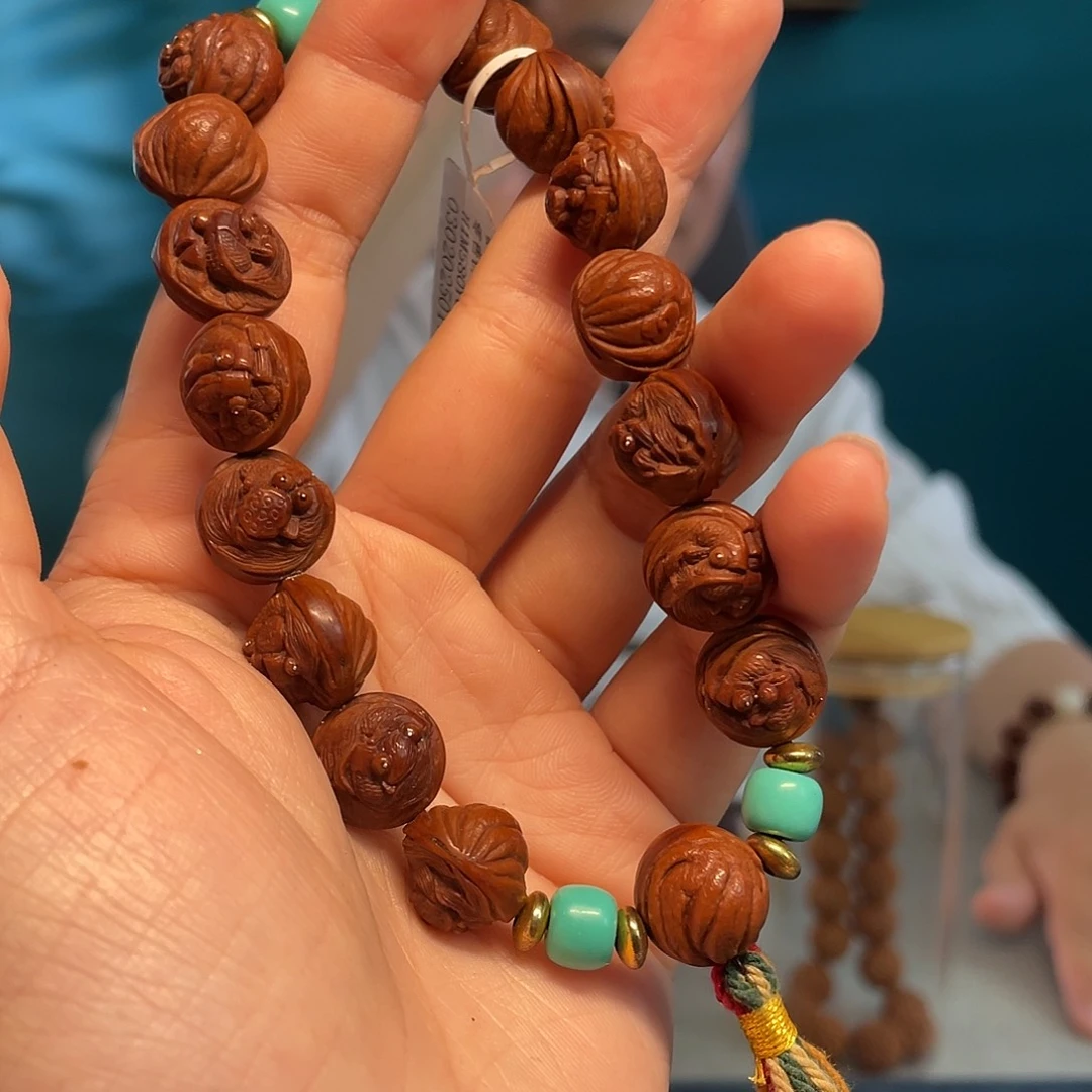 龙纹桃核金玉满堂核雕作品