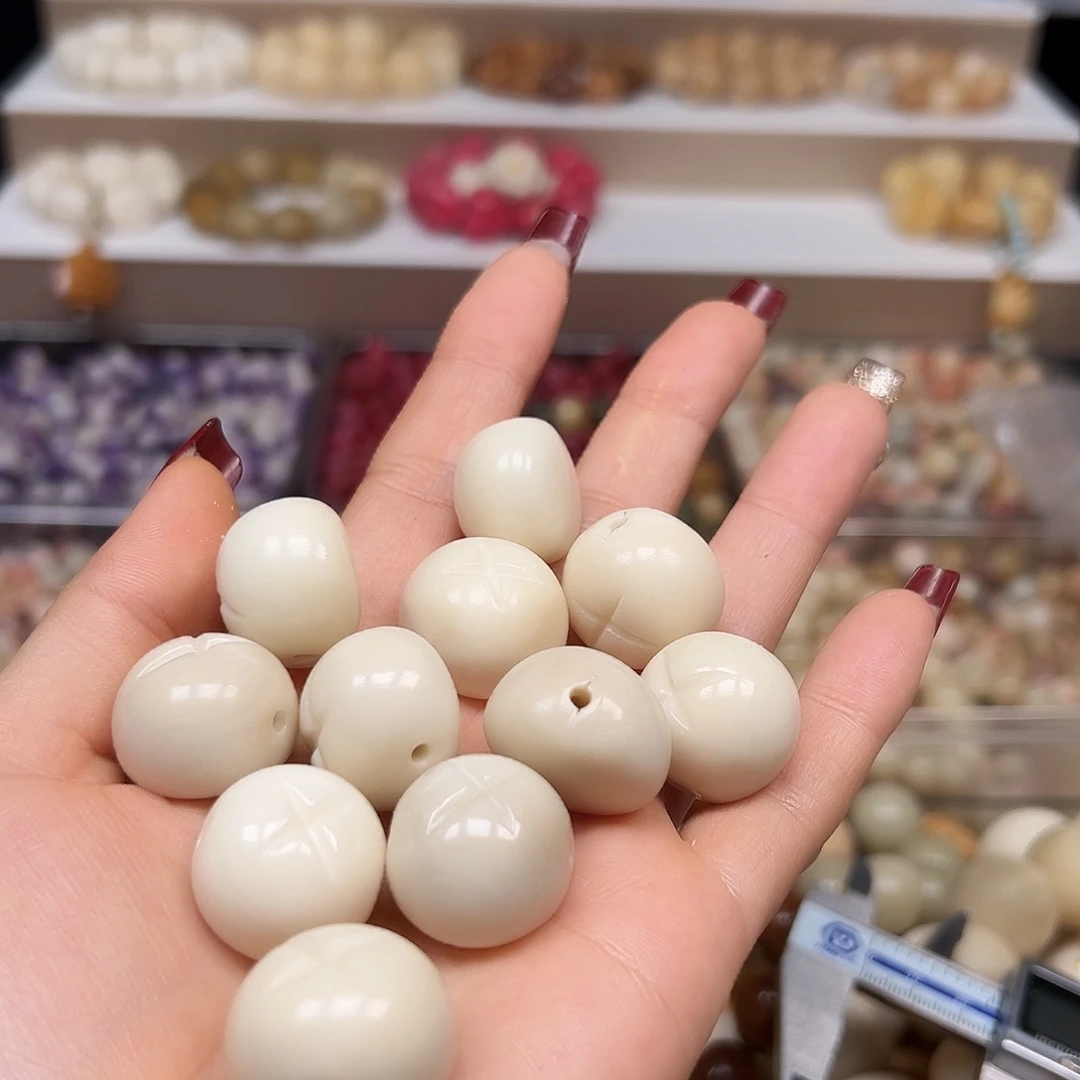 手串菩提根/象牙果瑕疵白小x宝11颗有裂