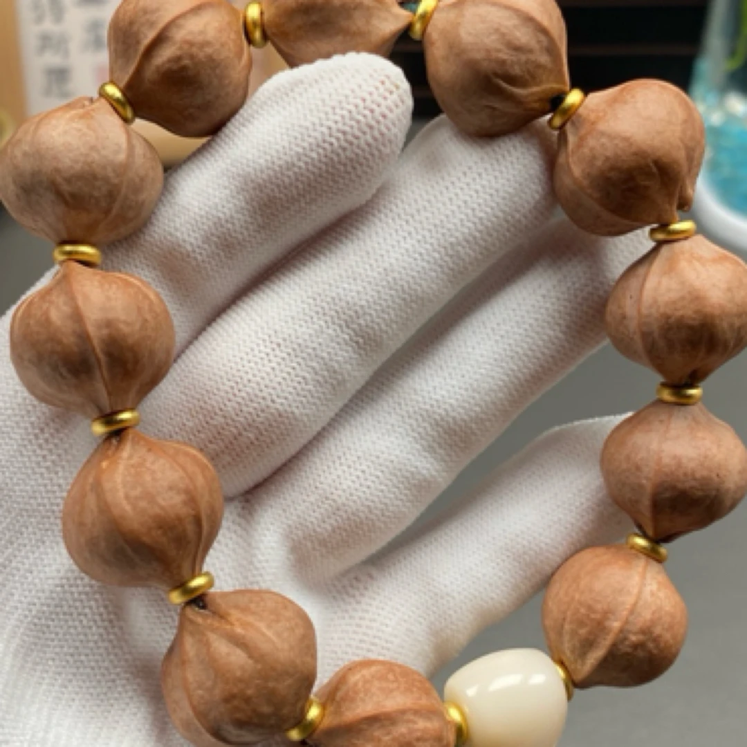20×21橄榄核铁核原皮手串