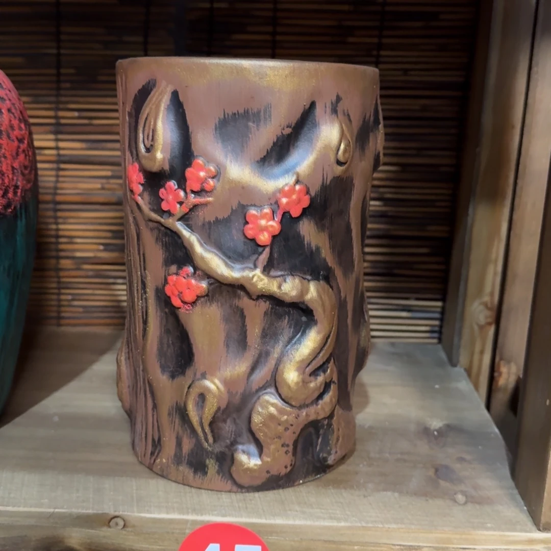 有孔红陶浮雕花盆炸炸炸