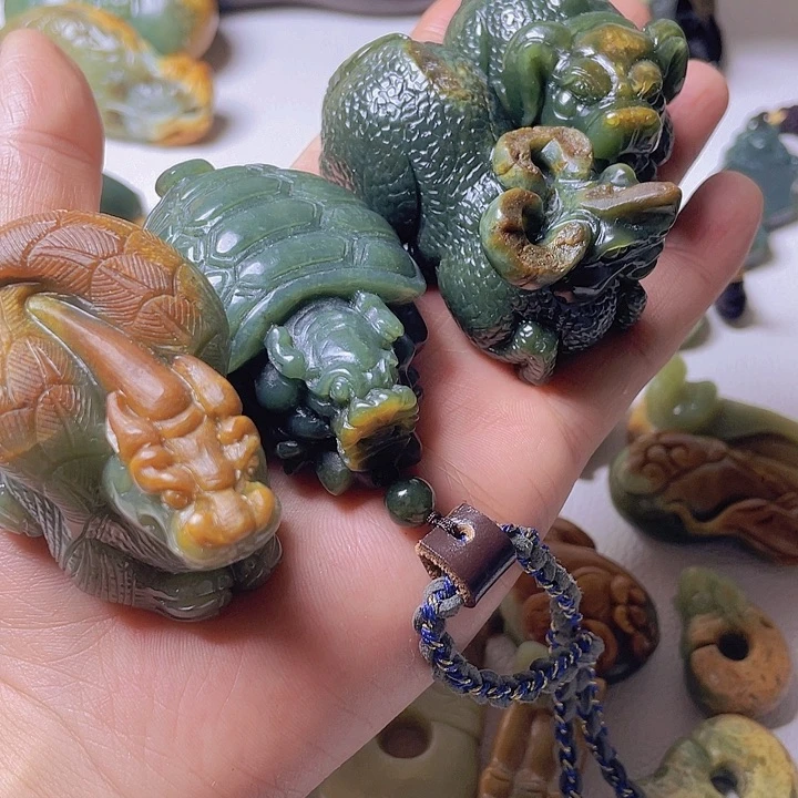 和田玉手把件未镶嵌巴**合