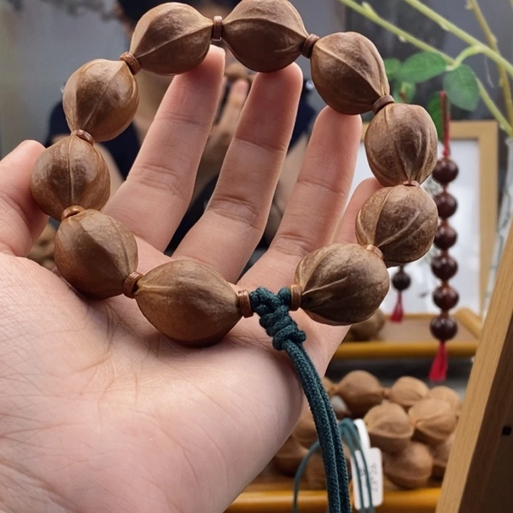 吊坠橄榄核抗****王梅林铁