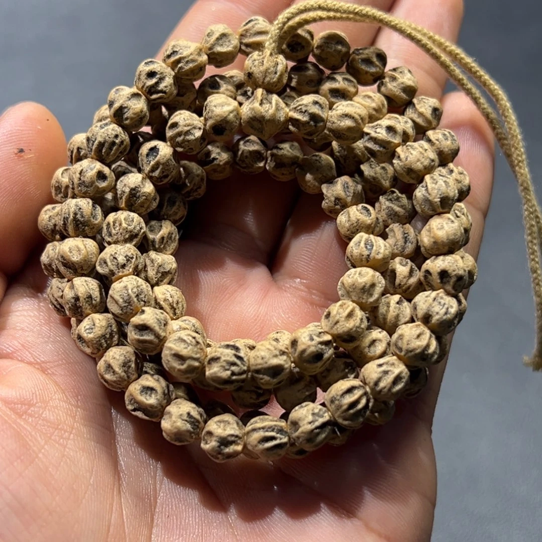 柏香籽/百香籽吊坠轮墓