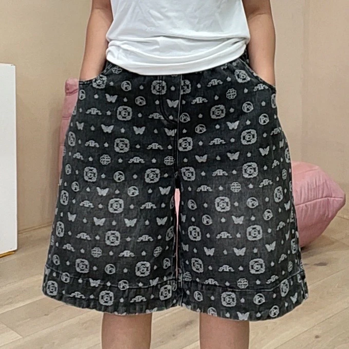 722欧货爆款色织蝴蝶图案牛仔六分裤女