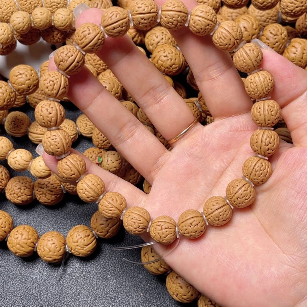 L***J桃核手串野生小籽