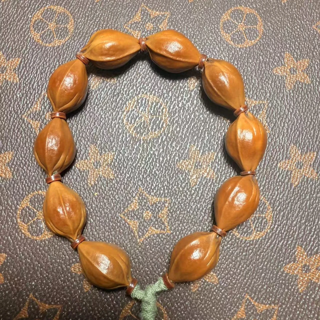 梅林铁核原生态素串16*25三面佛