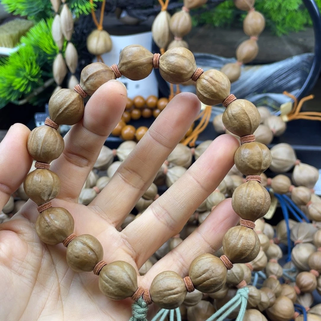 C***n吊坠橄榄核鲨鱼背