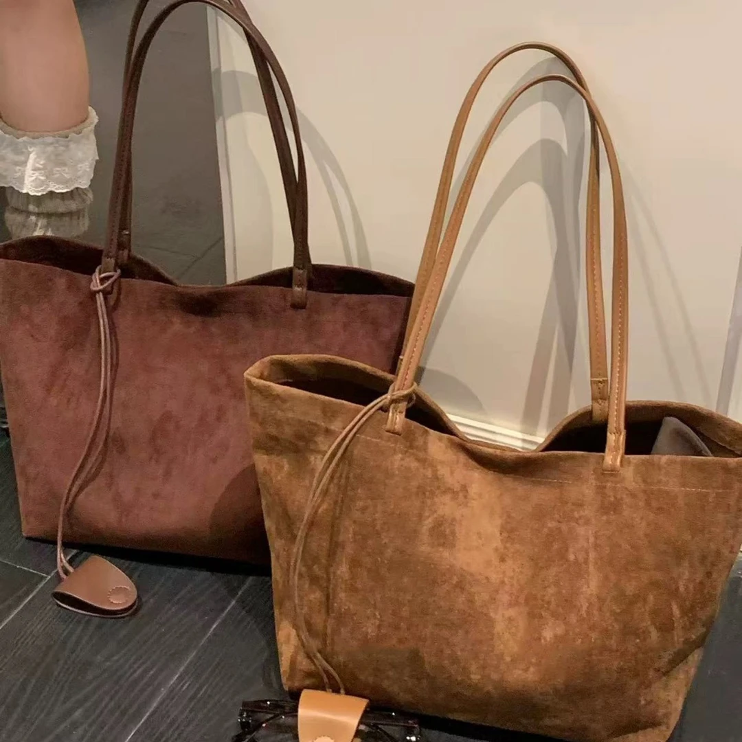 包包女款百搭气质双根耐磨小众爆款2025新款星星磁扣单肩托特包女