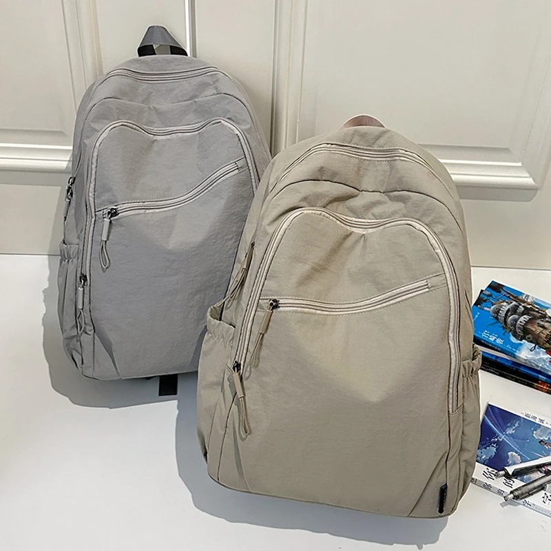 时尚百搭简约女双肩包高级感轻便休闲旅行男士背包大容量学生书包