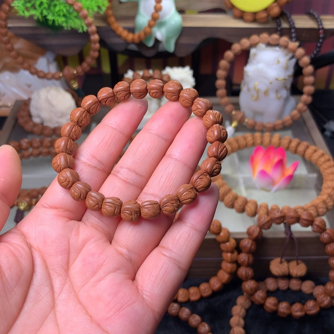 布***衣桃核吊坠玉龙脊手串09