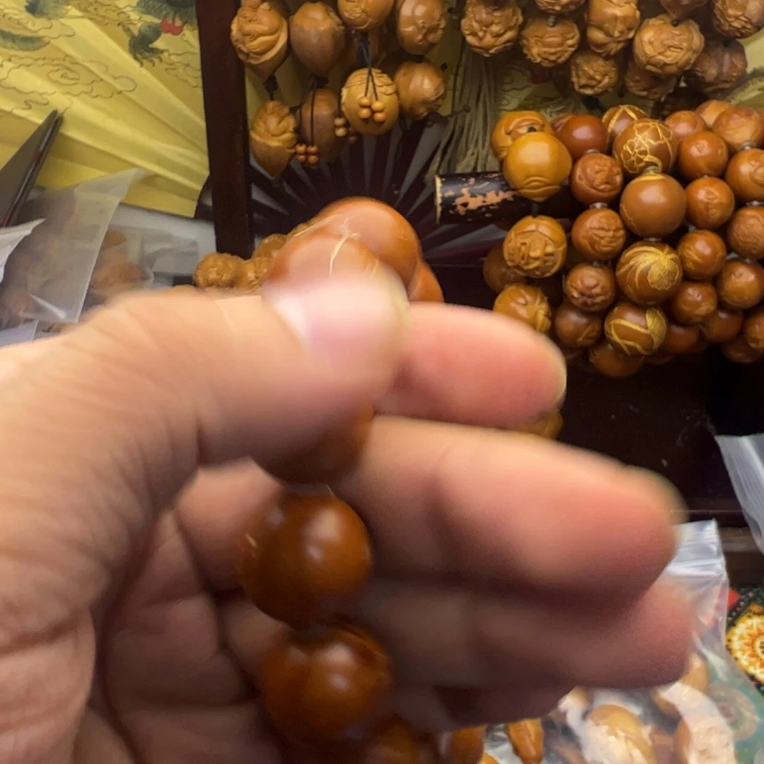 奋***哥橄榄核吊坠光洙微上色