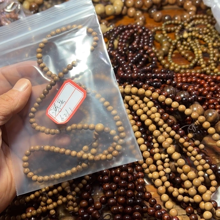 涛***聊ABS瑕疵珠0.6老山檀香