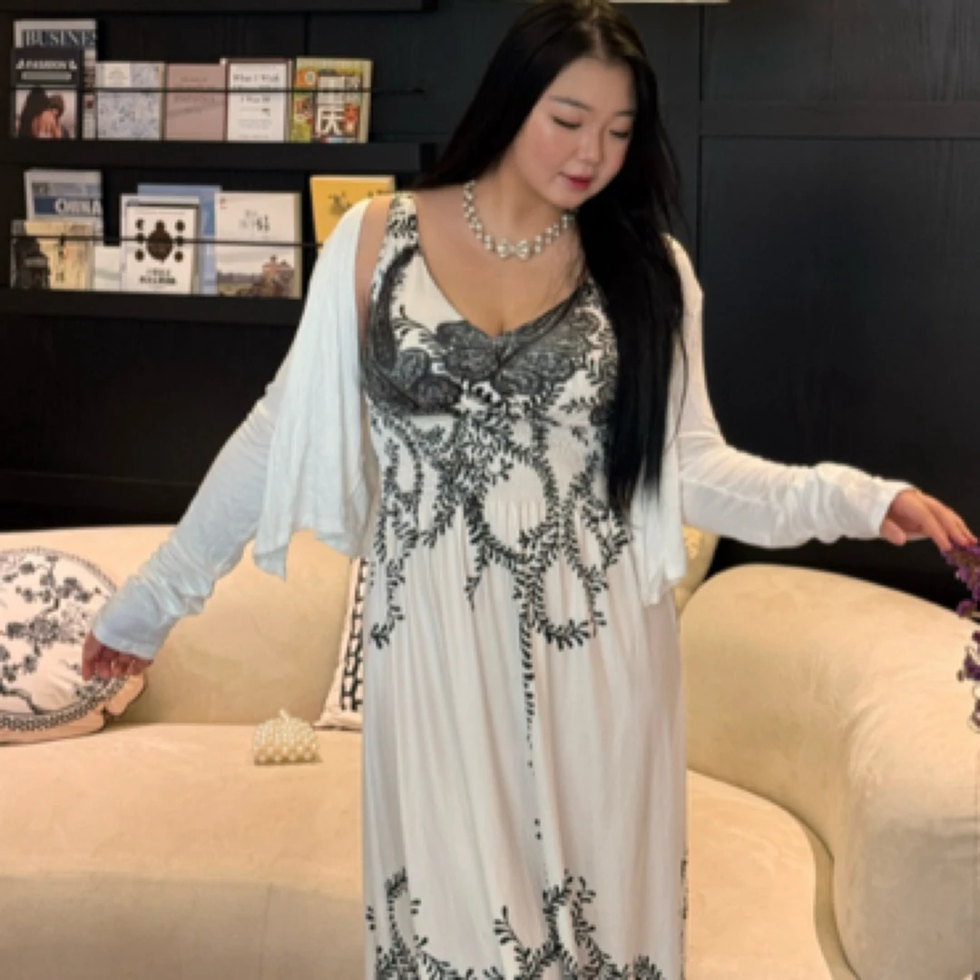 法式印花V领吊带连衣裙女夏季度假风收腰显瘦沙滩长裙