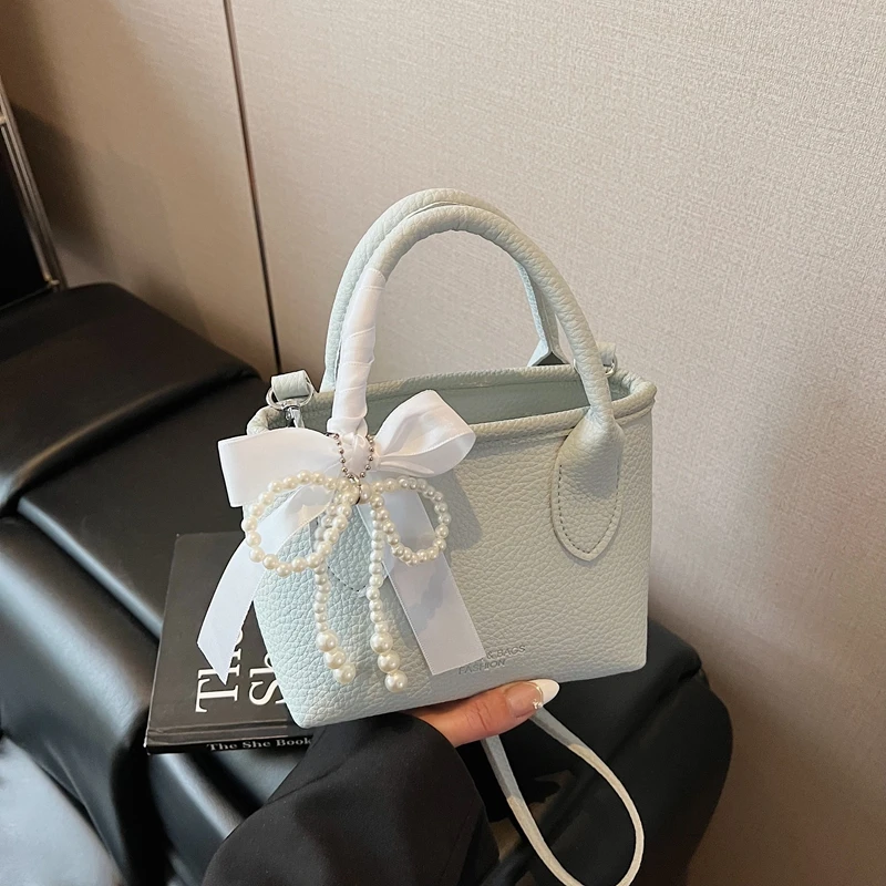 夏季小包包女2025新款百搭单肩斜挎包简约爆款今年流行手提水桶包