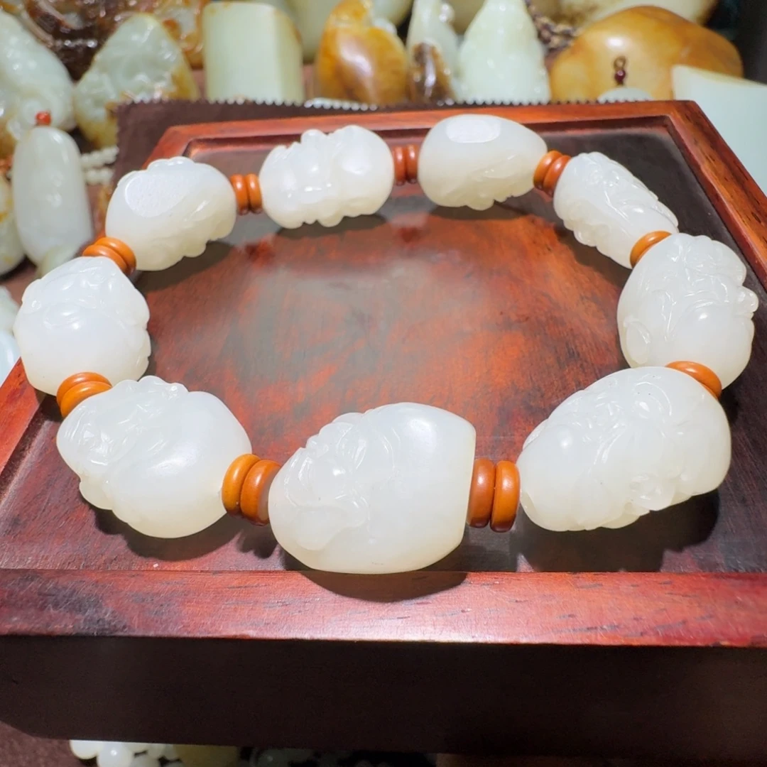 謝***丹和田玉未镶嵌手串